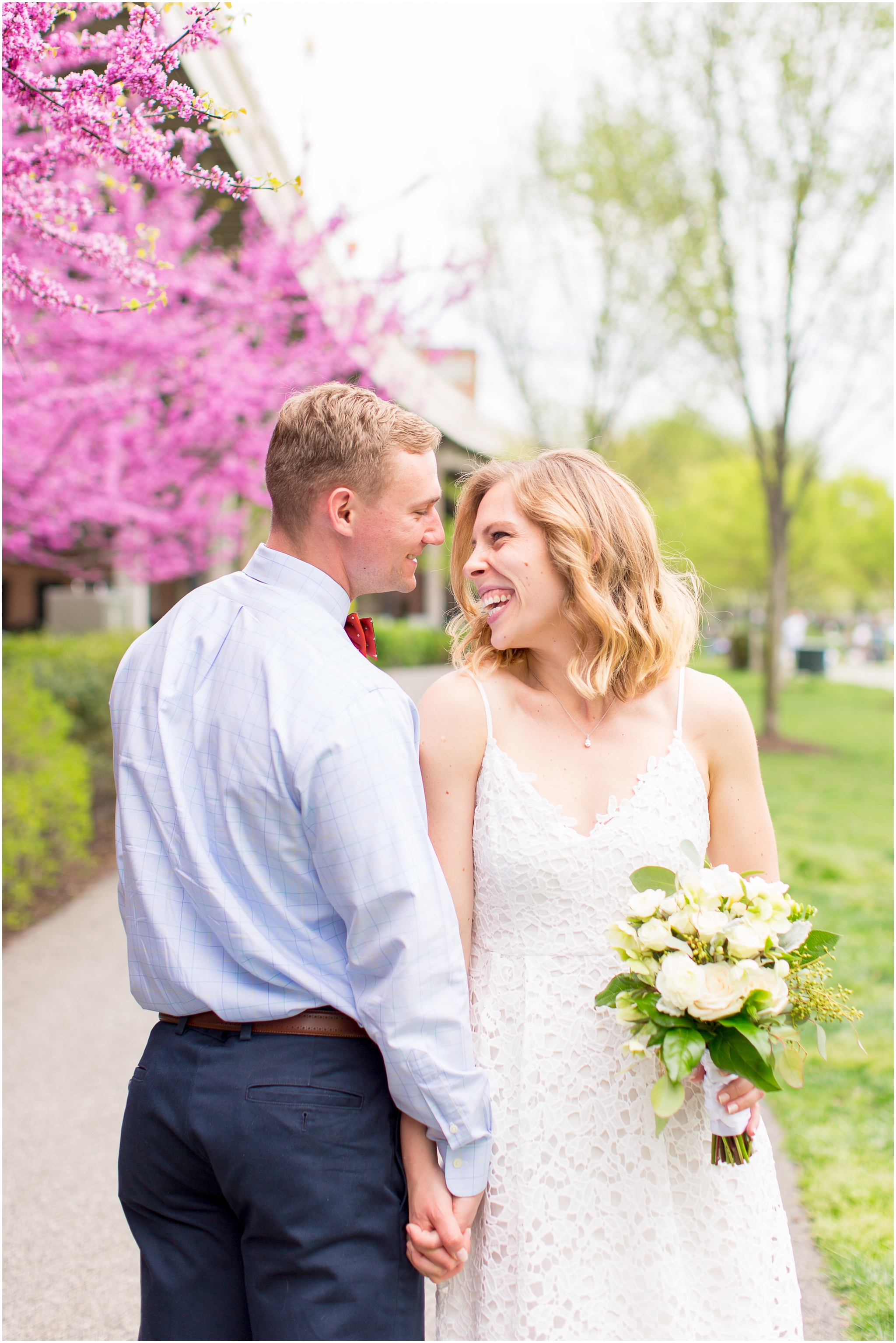 DC elopement photographer captured this Old Post Chapel wedding on Fort Meyer and along the Georgetown waterfront. This DC elopement included cherry blossom wedding photos and Georgetown wedding portraits. This wedding includes creative ideas for something blue and something borrowed!