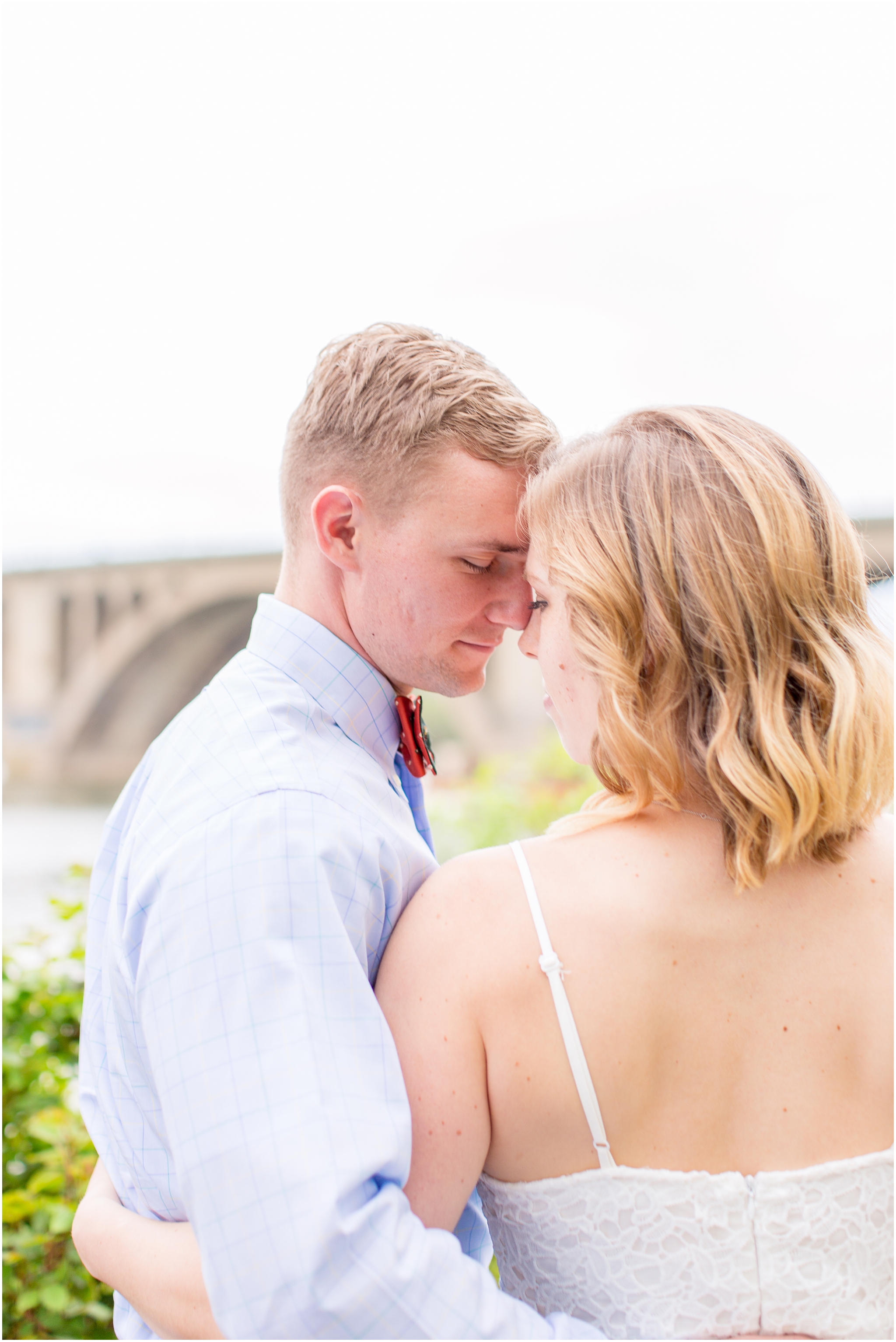 DC elopement photographer captured this Old Post Chapel wedding on Fort Meyer and along the Georgetown waterfront. This DC elopement included cherry blossom wedding photos and Georgetown wedding portraits. This wedding includes creative ideas for something blue and something borrowed!