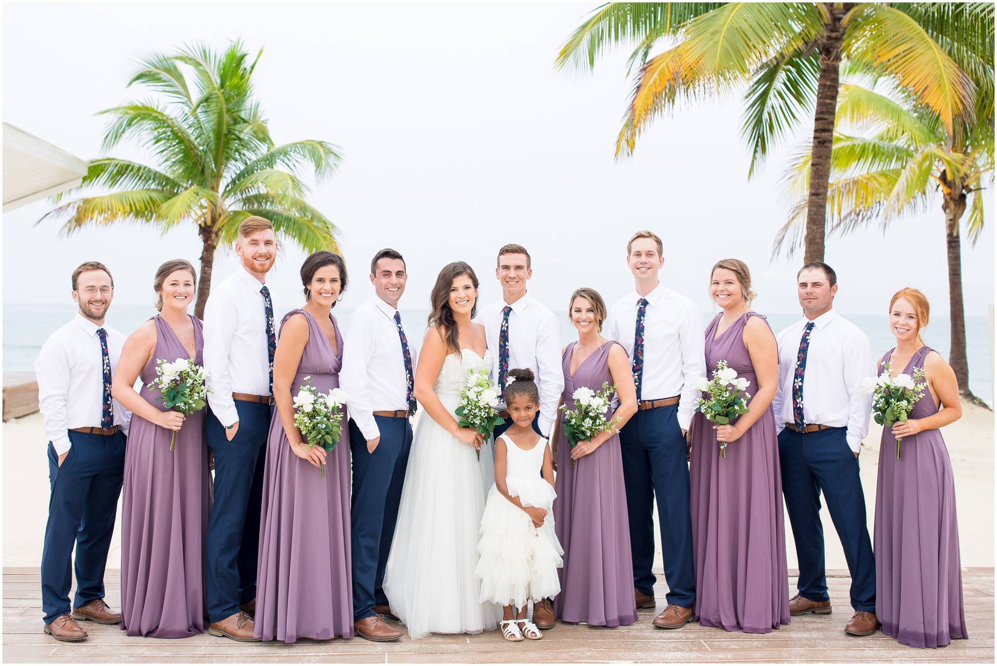 This Montego Bay wedding was a Jamaica destination wedding captured by Jamaica wedding photographer Taylor Rose Photography at one of the best Montego Bay wedding venues, the Royalton Blue Waters Montego Bay. This Royalton Blue waters wedding at the Royalton Montego Bay Jamaica included dusty purple bridesmaid dresses from Lulu’s and a beach ceremony.